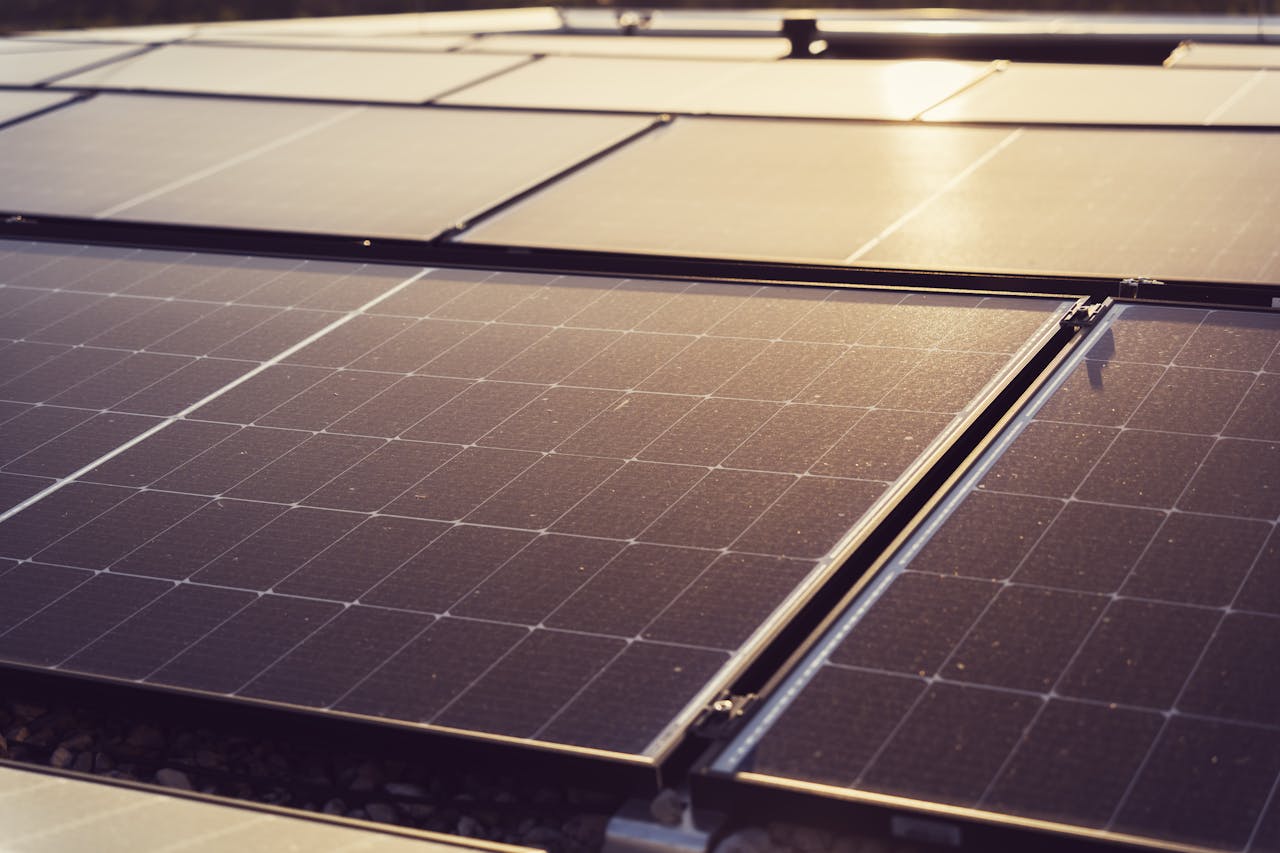 heros-img Detailed view of solar panels capturing sunlight, highlighting renewable energy technology.